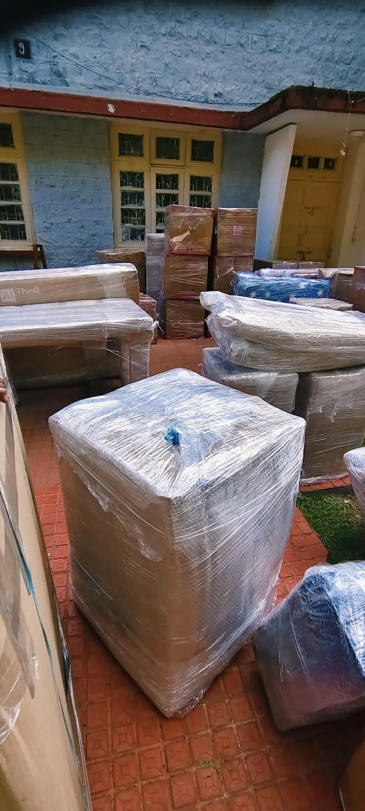 Office workstations being labelled and dismantled for a weekend corporate move in Coimbatore